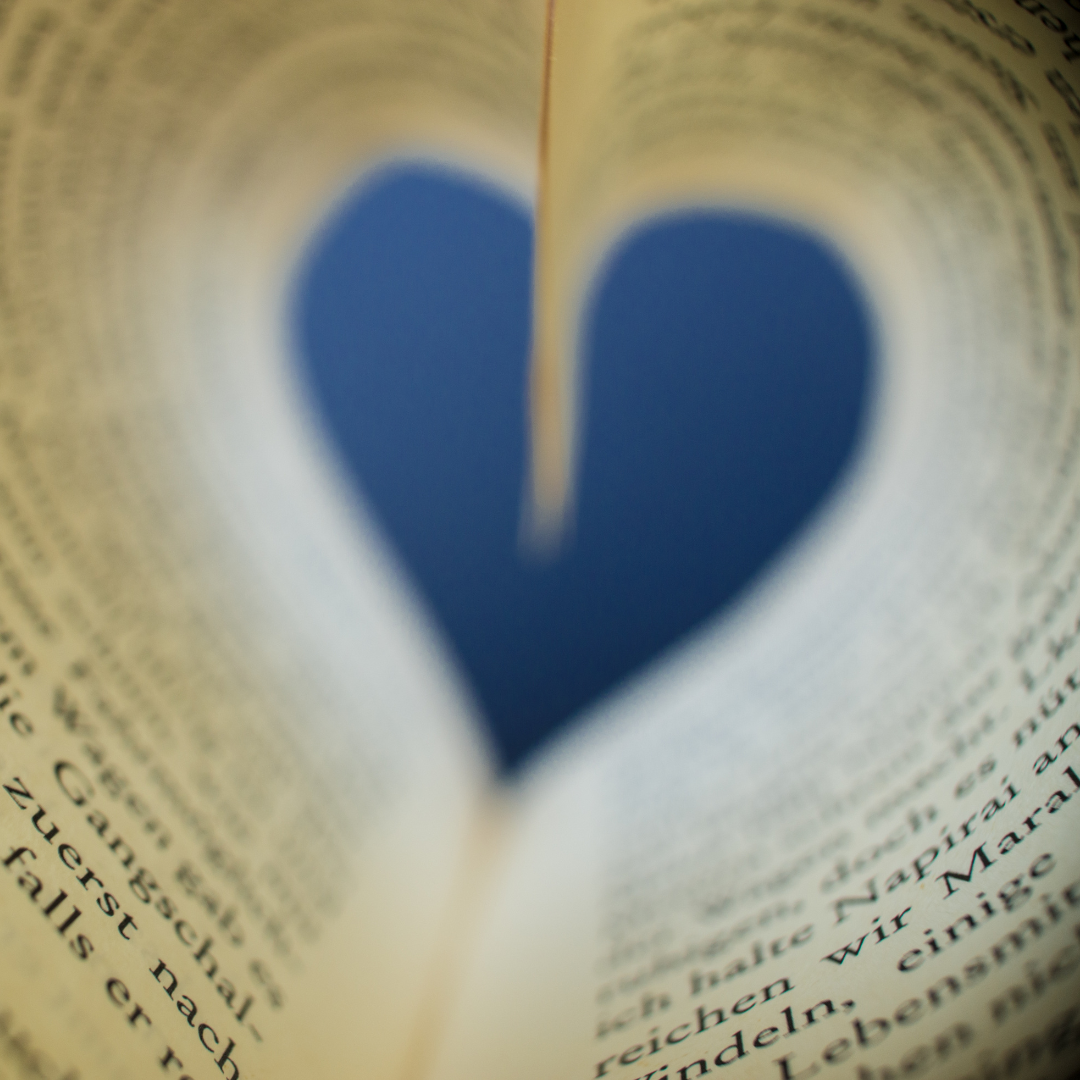 close up of book pages in the shape of a heart, decorative